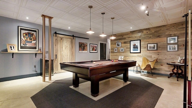 rec room featuring wood walls, a barn door, pool table, and recessed lighting