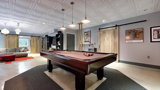 game room featuring an ornate ceiling, a barn door, billiards, and baseboards