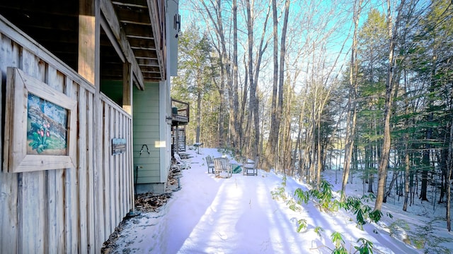 view of street featuring driveway and stairs