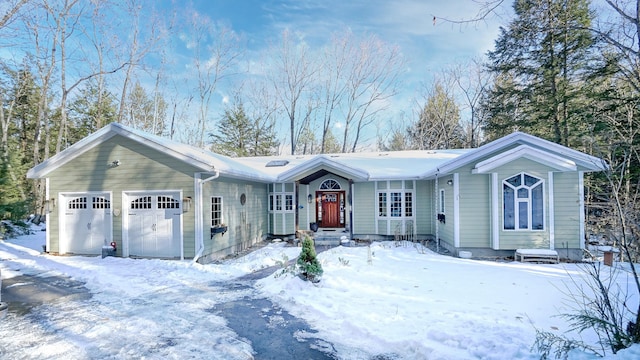 ranch-style house featuring an attached garage