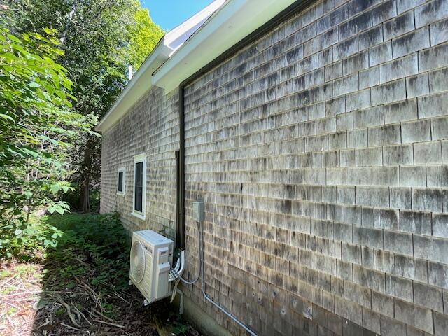 11 Sardine Way, Lubec, ME 04652 - view of home's exterior featuring ac unit
