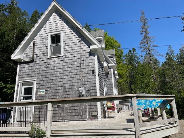 11 Sardine Way, Lubec, ME 04652 - view of side of home featuring a deck