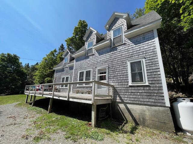 11 Sardine Way, Lubec, ME 04652 - rear view of house with a deck