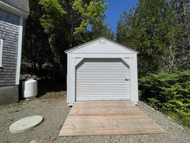 11 Sardine Way, Lubec, ME 04652 - garage featuring a storage unit