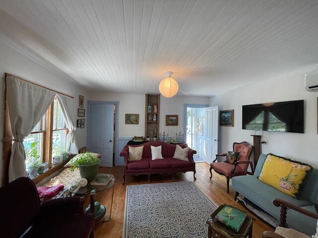 11 Sardine Way, Lubec, ME 04652 - living room featuring wooden ceiling, wood finished floors, and a wealth of natural light