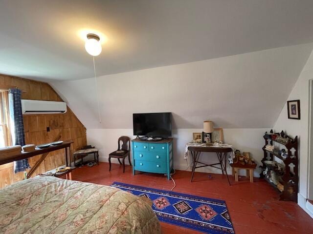 11 Sardine Way, Lubec, ME 04652 - bedroom with an AC wall unit, wood finished floors, and lofted ceiling