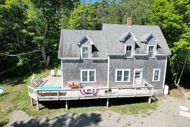 11 Sardine Way, Lubec, ME 04652 - rear view of property featuring a chimney and a deck
