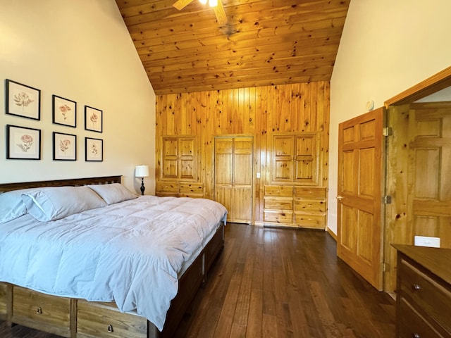 bedroom with high vaulted ceiling, dark wood-type flooring, and wooden ceiling