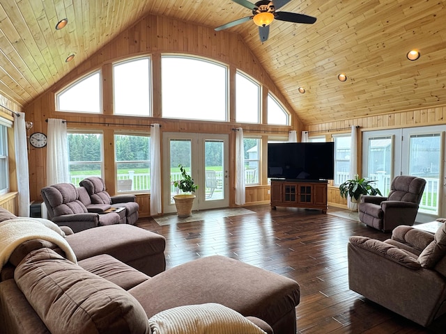 living room featuring wooden ceiling, a wealth of natural light, high vaulted ceiling, and dark wood-style flooring