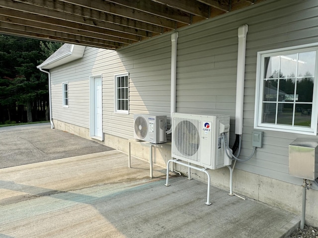 view of patio / terrace featuring ac unit