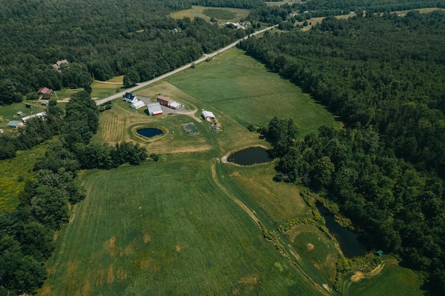 aerial view with a water view and a rural view