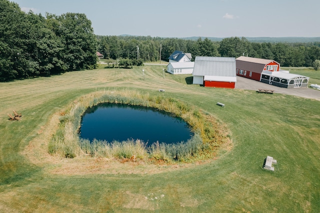 bird's eye view featuring a rural view and a water view