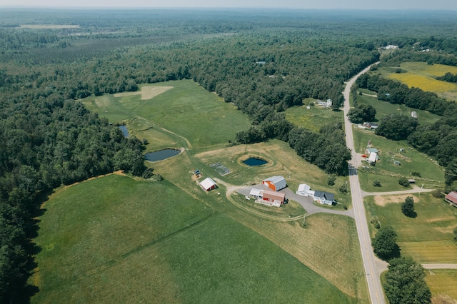 aerial view with a rural view and a water view