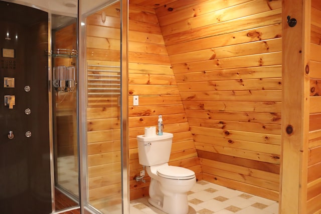 bathroom featuring walk in shower, wood walls, and toilet