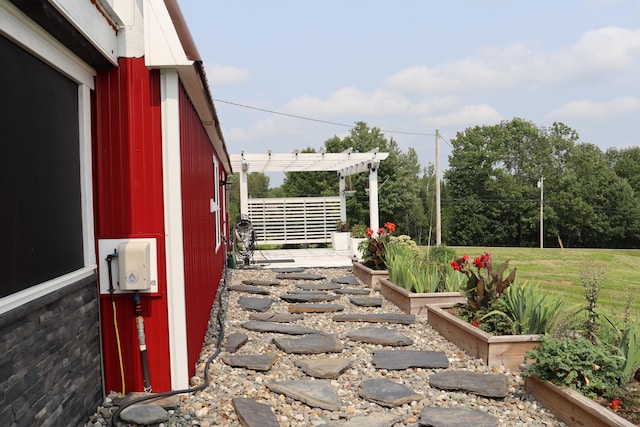 view of patio featuring a pergola