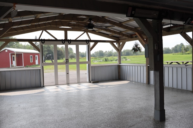 view of patio / terrace with a shed, a gazebo, and ceiling fan