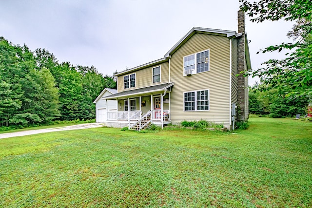 view of front of house with a front lawn and covered porch