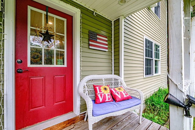 doorway to property featuring a porch