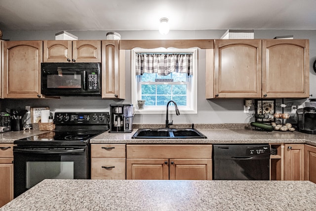 kitchen featuring sink, black appliances, and light brown cabinets