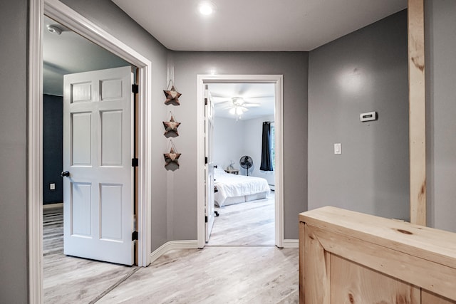 hallway featuring light hardwood / wood-style flooring