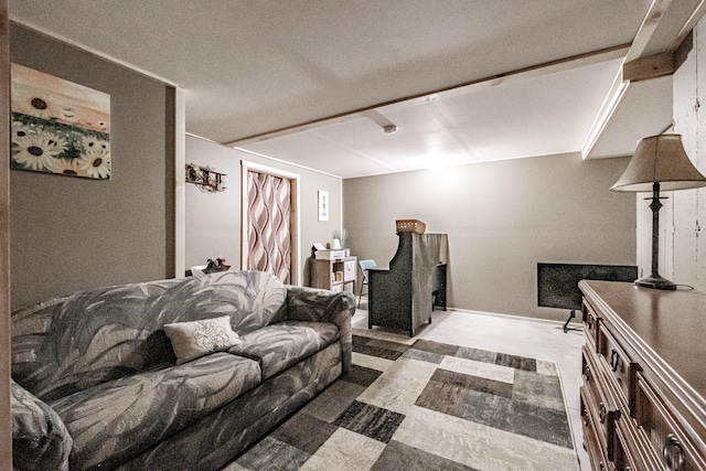 living room featuring a textured ceiling and carpet floors