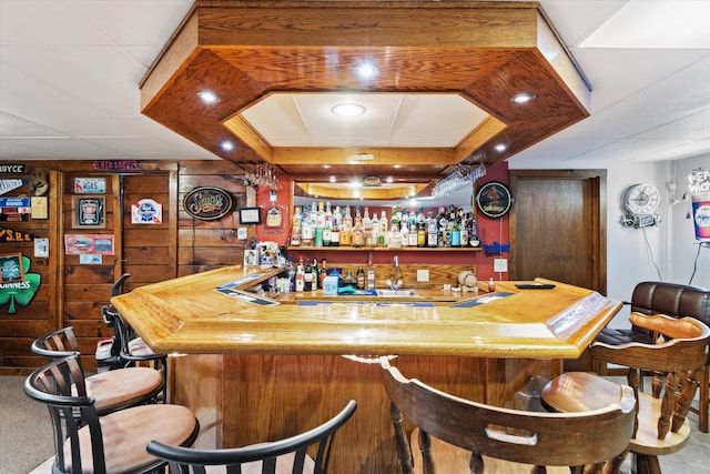 bar with indoor bar and recessed lighting