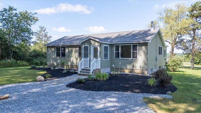 single story home with a front lawn