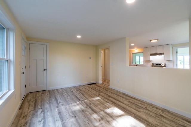 interior space with light hardwood / wood-style floors