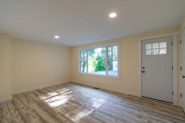 foyer with light hardwood / wood-style flooring