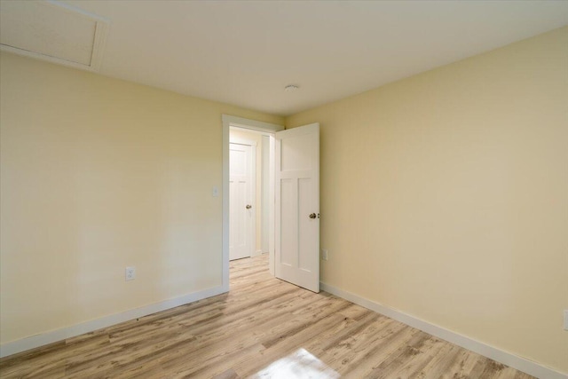 unfurnished room featuring light hardwood / wood-style floors