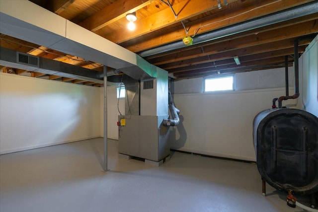 basement featuring heating unit