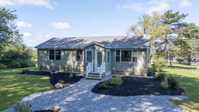 view of front of property with a front lawn