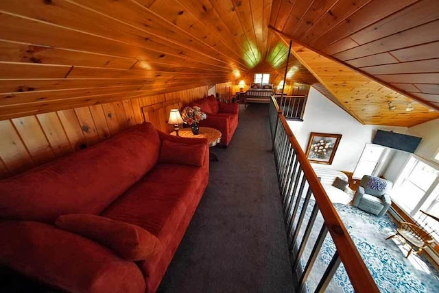 interior space with lofted ceiling, wood ceiling, carpet floors, and wooden walls