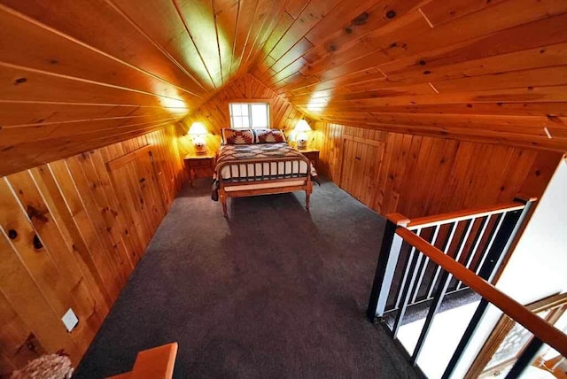 bedroom featuring carpet, lofted ceiling, wooden ceiling, and wood walls