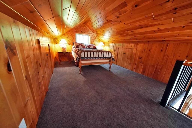 carpeted bedroom with lofted ceiling, wooden walls, and wood ceiling