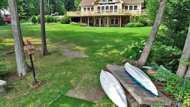 view of yard featuring a deck