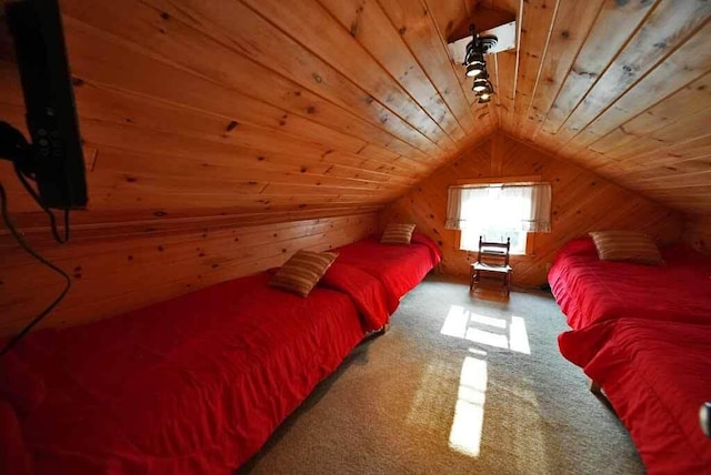 carpeted bedroom with lofted ceiling, wooden walls, and wooden ceiling