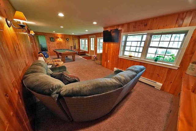 game room featuring carpet flooring, billiards, wood walls, and a baseboard heating unit