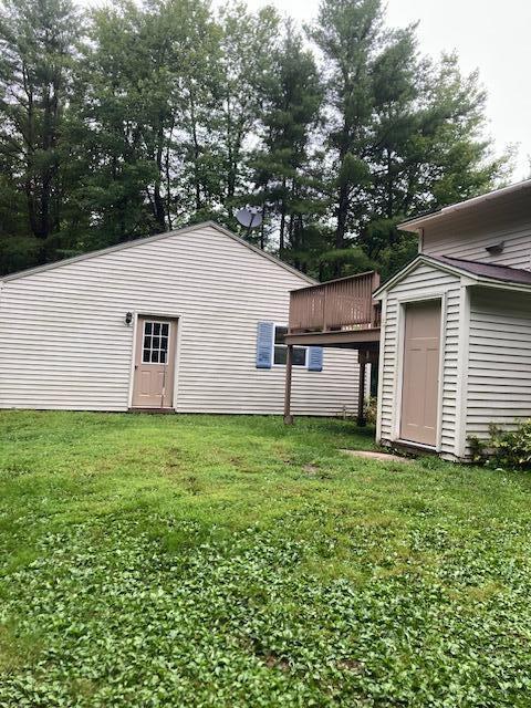 view of yard with a storage unit and an outdoor structure