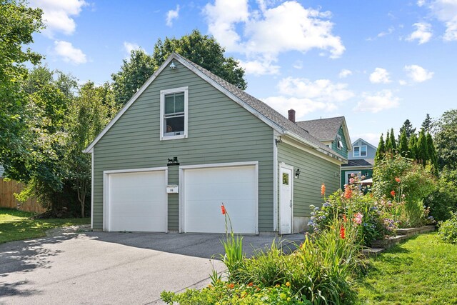 view of home's exterior with a garage