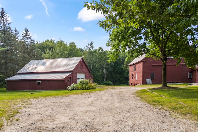 view of property exterior with a yard