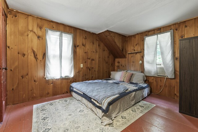 bedroom featuring wooden walls and cooling unit