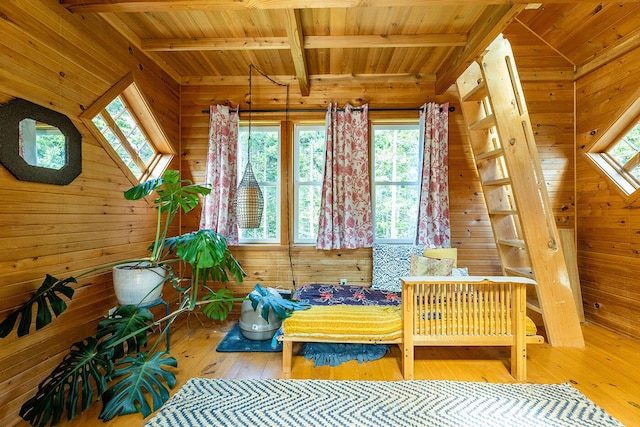 interior space with wood ceiling and beam ceiling