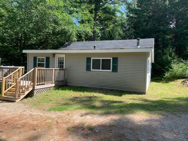 view of front of home with a wooden deck