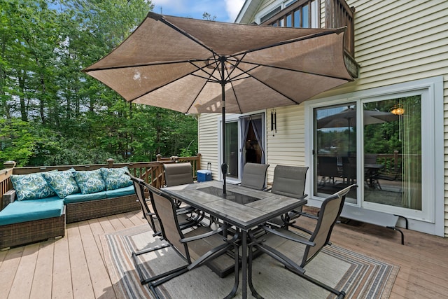 wooden terrace featuring an outdoor living space