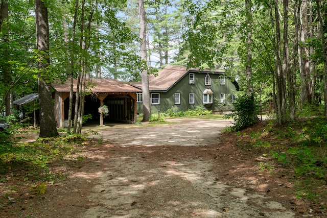 view of front facade with a carport