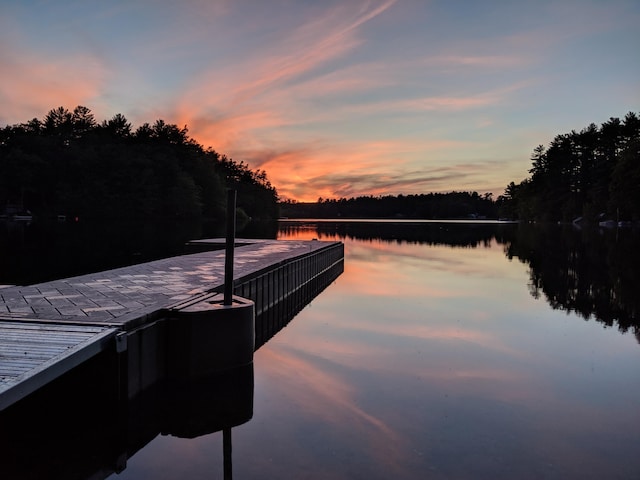 dock area with a water view