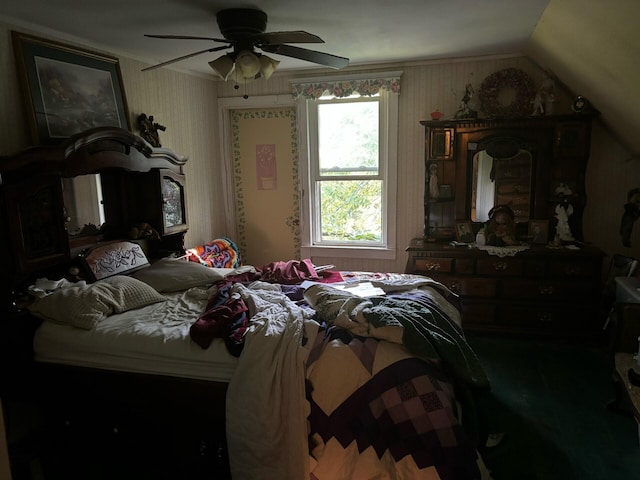 bedroom featuring lofted ceiling and ceiling fan