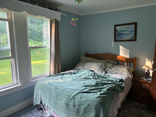 bedroom with ornamental molding