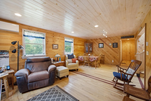 living room featuring an AC wall unit, wood walls, hardwood / wood-style floors, and wooden ceiling